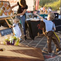 Kids playing doughnut toss